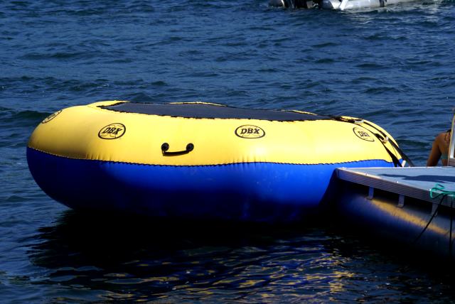 On Wednesday, strong winds from the south tested the moorings of rafts.  At least one anchor failed that test and us northenders gained one raft.  The rightful owners made claim to the float about an hour later.