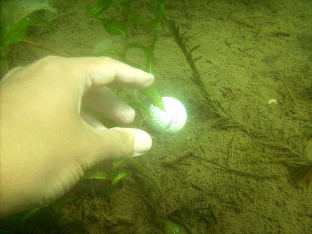 About 1500 pounds of air (little over a half an hour) was spent under the northeast shore of the lake.  We picked a few golfballs from the lake floor.