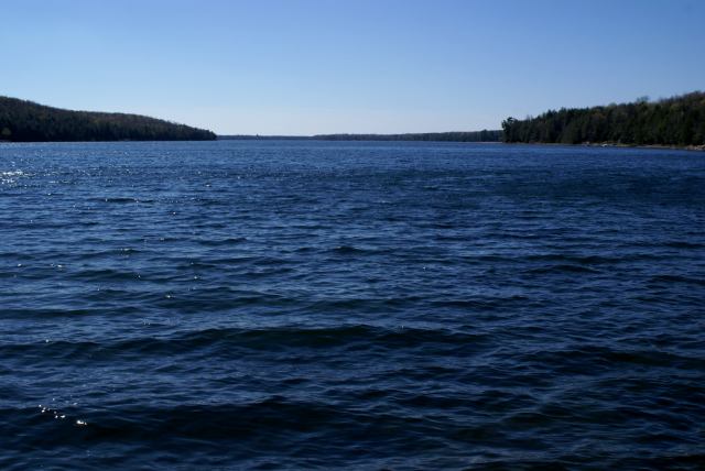 Saturday's weather was supposed to be mostly cloudy and rainy.  It turned out instead to be blue skyed and warm.  Great for pier placing, picnicking and golf.  Not so great for raising the lake level.  Maybe the DNR is holding the rain for the weekdays, leaving the weekends dry.  How nice of them.  The homeopathic amount of rain last week did move the fire danger from EXTREME to VERY HIGH.  That should go to LOW by mid-week if we get the more traditional April storms predicted next week instead of last week's very small amount of rain that somehow "remembers" larger storms.  More piers are in but there are no skiers yet, at least I didn't see any.<br><br><br>-Nemo, not a fan of homeopathic rain.
