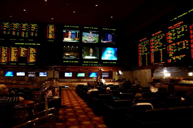 The Vegas sports book at the Mirage.  An easy and ecological way to flush away unwanted cash cluttering your wallet.  Sundays are particularly fun here.  Watching 6 football games at the same time with 100's of new friends takes the sting out of foolish bets involving the Bears and their 2 game habit of winning but not covering the spread.  Shortly after taking this picture I was told by a very nice/direct/serious man with a badge that it was not permitted to take pictures of the sports book.  So now you know.