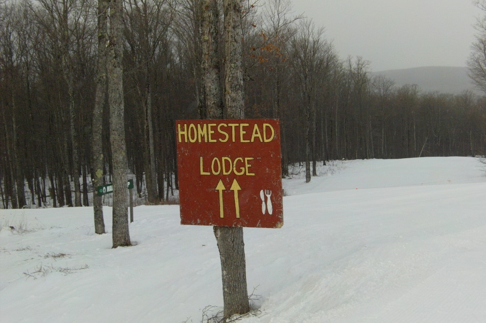 Homestead Lodge is a big cabin with several wood burner heated rooms and food in the middle of the back runs at Brule.  On the lower right of the sign is a knife and fork.  It would seem that anti-spoon bigotry is alive and well on top of Wisconsin.  We showed solidarity with our spoon brothers by not going into the Homestead Lodge.  Also it was locked (too cold to open is the spiel we heard).
