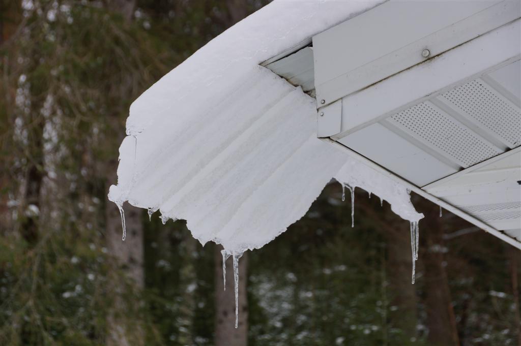 On many metal roofs, in addition to a trickle of snowmelt,  big wet slabs of snow slowly slide off and slop on the ground.  The sound this makes can wake one out of a deep sleep.  On a similar note, the sound of a noisy badger living under your bedroom can also end sleep.