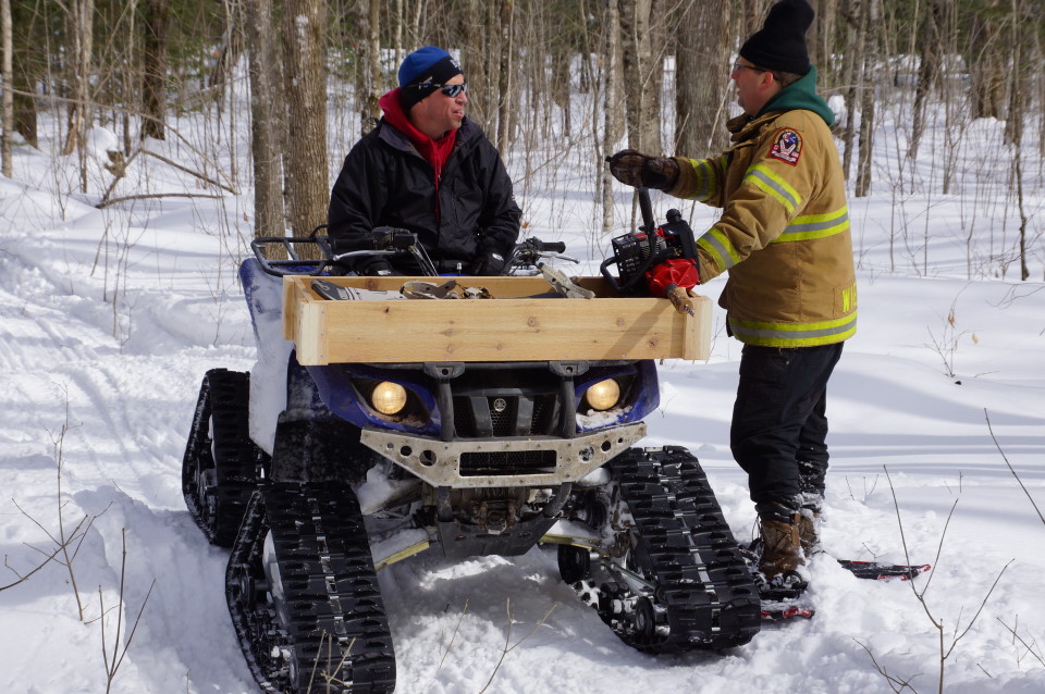 The snow is 2 or 3 feet deep in the woods and deeper in some spots (!), forcing not only the tappers to wear snowshoes, but their rides too.