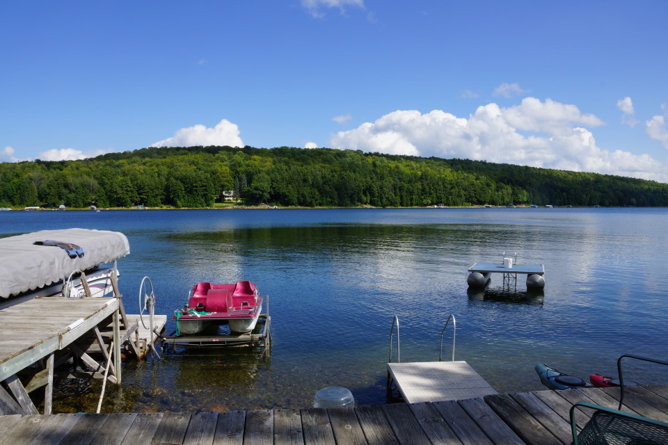 The season resembles a chimera type beast.  The water temperature (72°F) suggests it's mid June.  When the sun is out, it tastes like July.   After the sun sets, it feels like early Fall.  As long as the lake is flat and there's gas in the boat, I guess it really doesn't matter.