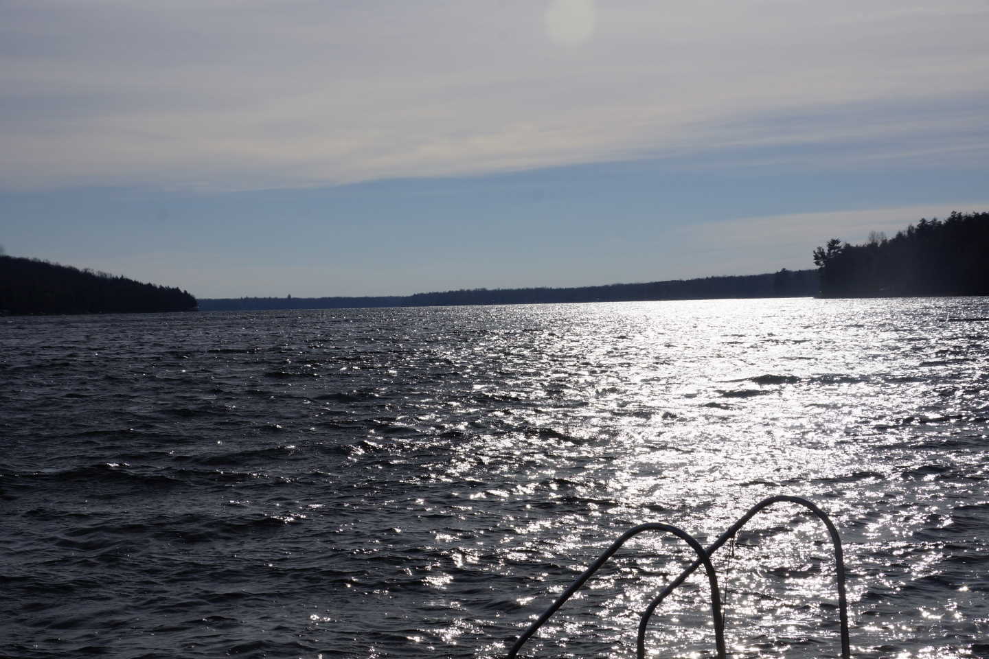Lake Lucerne is on the 16th tee in ice-in terms.  The lake was in the rough much of the week with waves breaking on the still iceless shoreline.  By the late weekend, the water was as flat as a just mowed green and as cold and clear as a high mountain water hazard.