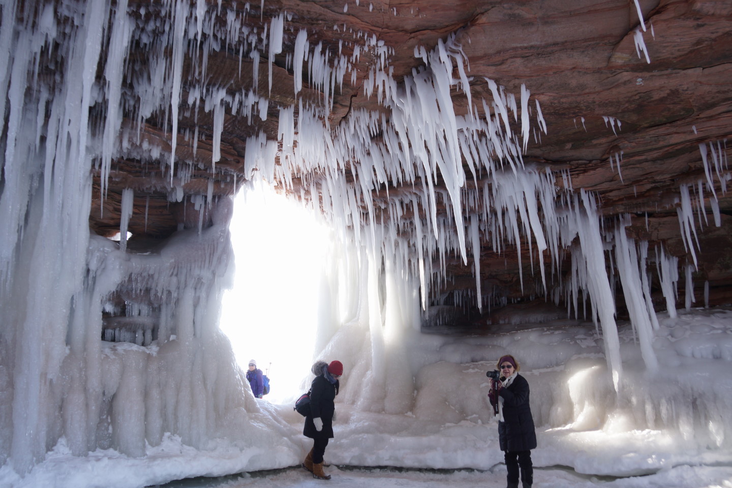 The air temperature inside the caverns seemed about 10 degrees (F) cooler than on the shore of the lake.  The ice color ranged from brownish to white to blue.  Floors were slippery.