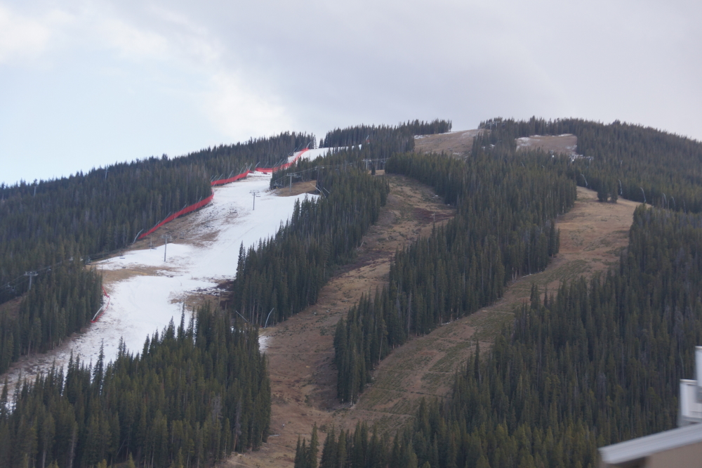 We passed by Copper Mountain on our way back to the cold. Of the runs visible from I-70, it looked like there was a bit of snow on Rosi's Run. Overlode and Ore Deal were snow free. You might want to wait a day or three before getting a lift ticket.
