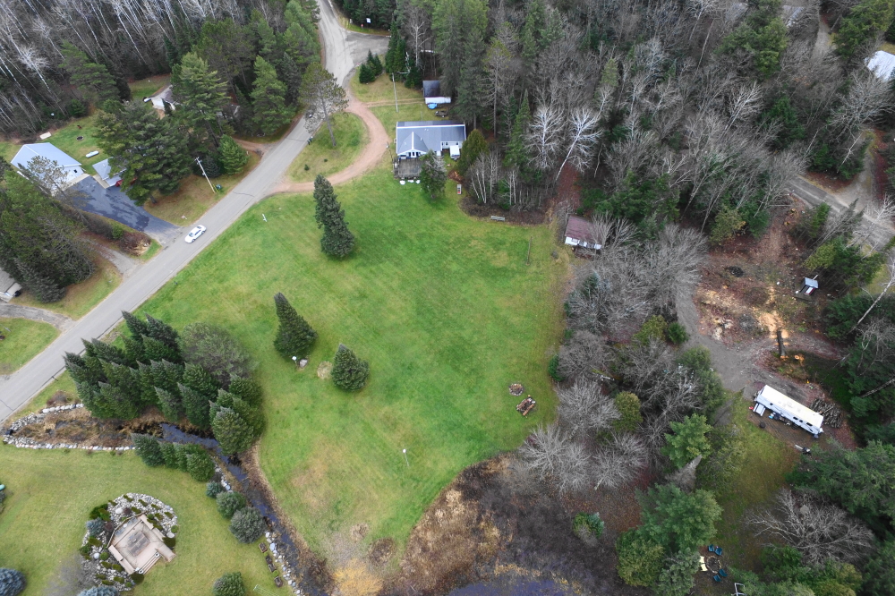 The rain and melting snow have greened up lawns around the lake. If this continues, a rare and unwelcome December mowing will be added to most task lists.