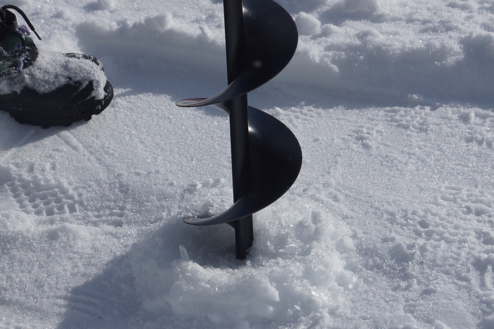 Late last week, it was time to check on the thickness of the ice. It took a while to get through to the juicier part of the lake.
