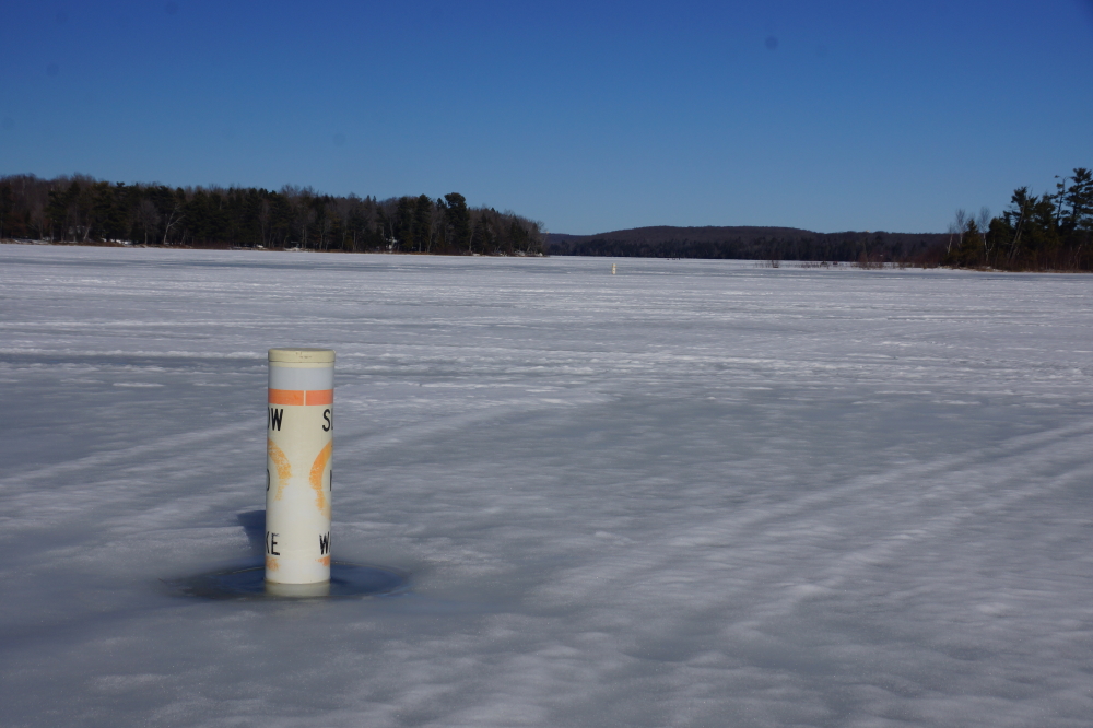 The two buoys on the South end of Lucerne are free from the lake ice! They can bob up and down, but there's still not much side to side freedom.