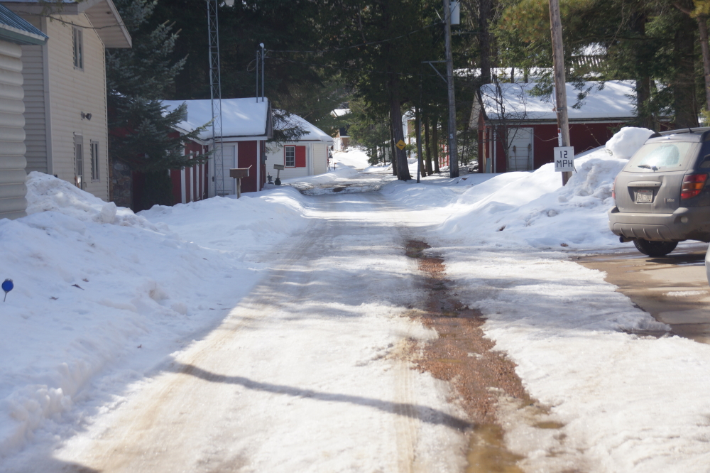 Knott Lane is getting better. It's quite nice where the road is peaking out from under the ice. Other parts are still treacherous.