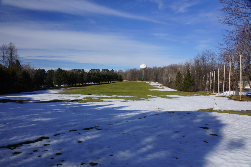 Patches of exposed grass led some to try to get in their first round at the NCC golf course. The first round will have to wait a bit longer. Some fairways were playable, but the greens and tees were still snow sopped.