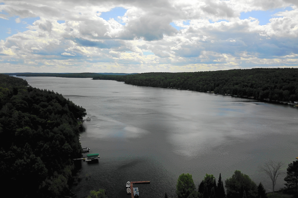 The forecast last week could have been "Summer with impending gloom". It started off sunny and calm (and a little cool) and ended in rain (also with a little cool). The lake temperature is hovering just above 70℉, which should keep the swimmers pinkish and talk of ice-in among the men at a minimum. It might be best to pick up a tow rope and get in as many runs as possible to ward off any post hypothermic flash backs of calm skier-less waters. It also might be a good idea to begin to line up a crew to pull boats, lifts, and piers. Unless you enjoy doing such tasks by yourself. Then give us a call and we'll set up a time in a few weeks for you to pull our lift too, thus doubling your enjoyment!<br><br><br>-Nemo does not enjoy such tasks even with a hoard or more.