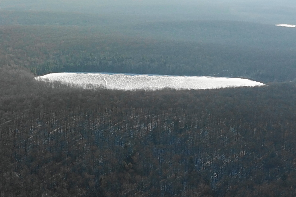 Just over the hill to the east, Devils Lake is ice covered.