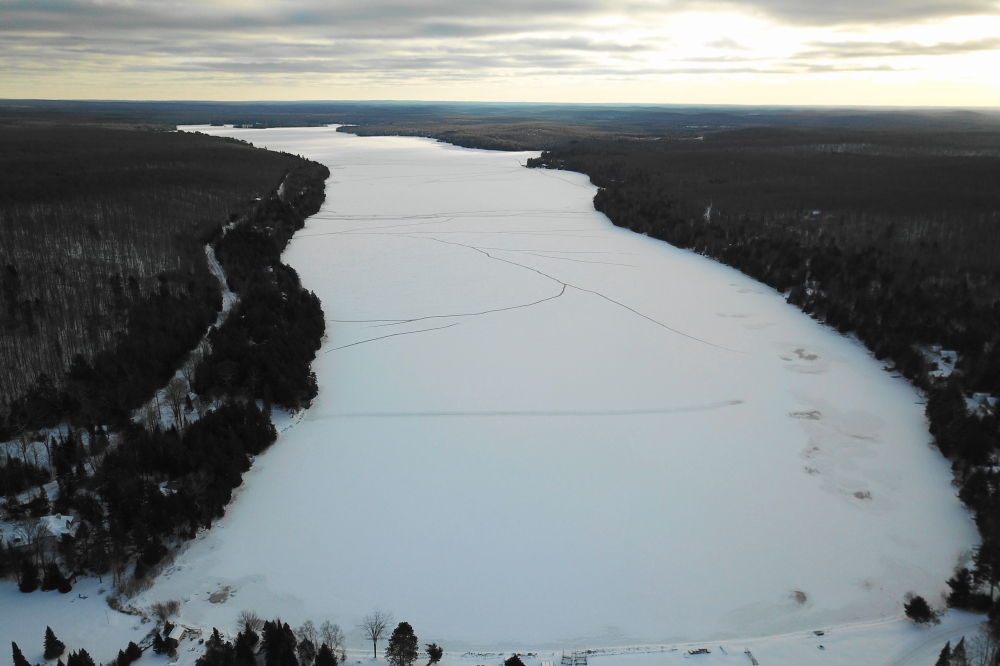 The air was freezing<br>The last open water gone<br>Ice covers the plain.