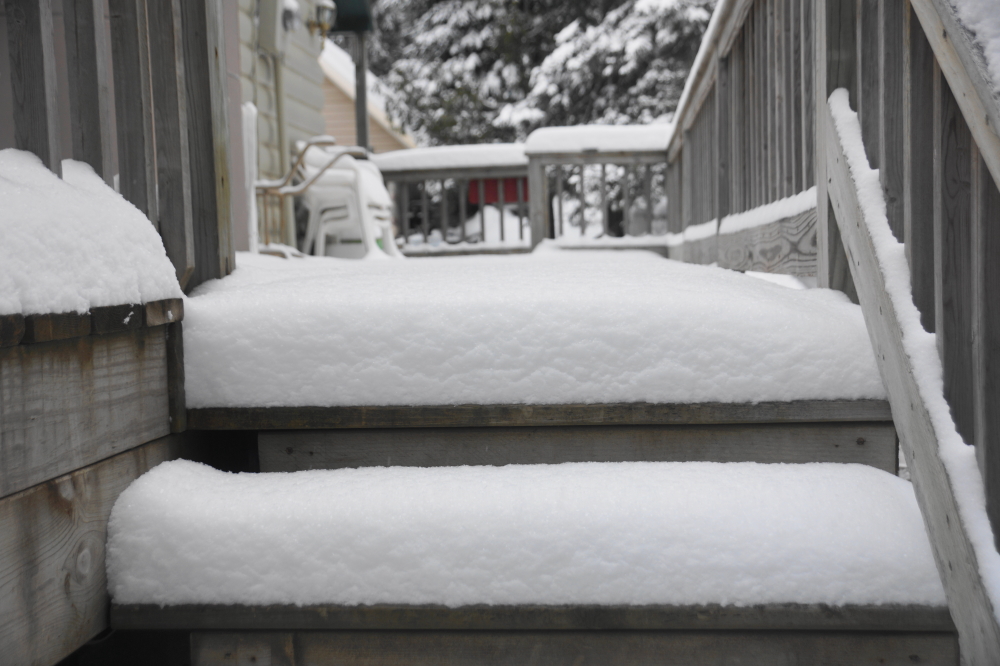 Shoveling ain't fun.<br>The lightness of the snow helped.<br>The deck snow remains.