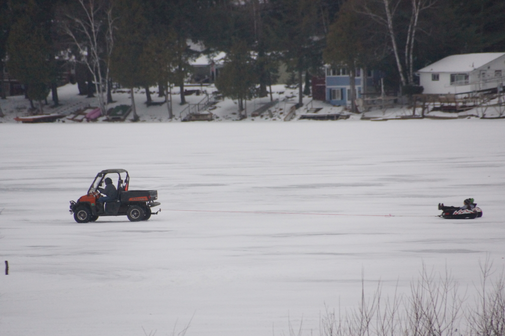 First! Some lake enthusiasts saw the warm and couldn't wait for ice-out.