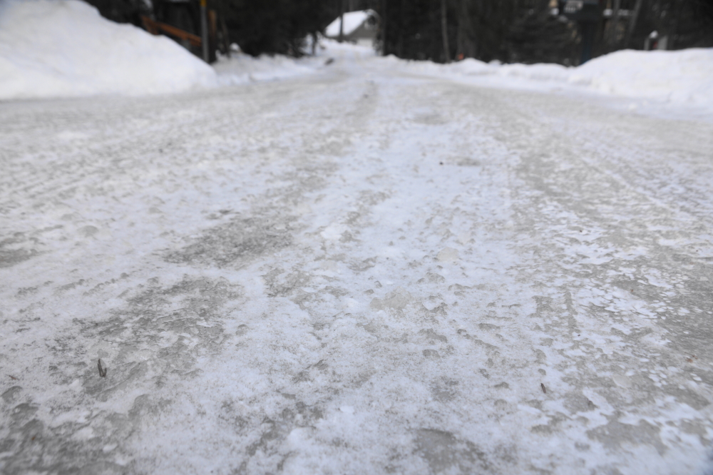 The mid-week thaw was long enough to slushify much of the snow, but not long enough to have that slushy water flow away. The resulting ice that was formerly called Knott Lane is not as thick, but every bit as hard as the lake's.