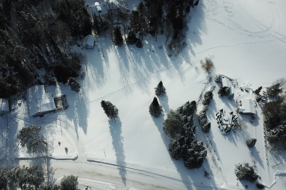 Every road that is not a state highway has some degree of snow/ice cover. Speeding into the curves is not recommended.