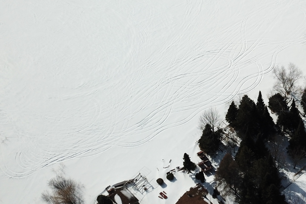 The lake seems fine for driving as evidenced by the patterns on the surface snow. 
