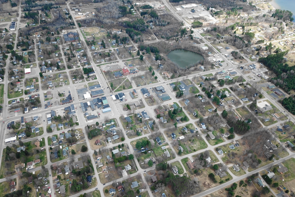 Looking over the hill at Crandon, Surprise Lake is open and the city is mostly snow free.