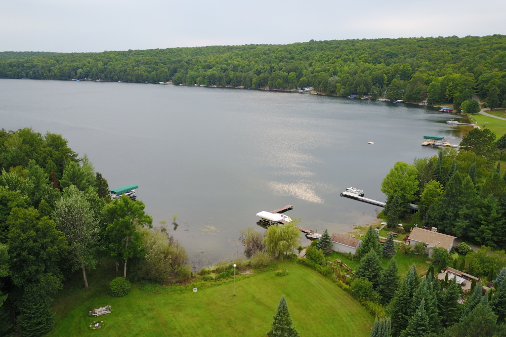 Last week started a season's end trend of not-as-hot weather. Absent were the Sunny, mid 80's ℉. Present were clouds and the 70's℉. Still, the sun did peak out on occasion and, while the lake temperature slipped, it remained above 70℉. Evenings were especially pleasant as the sound of loons washed up on the shore and campfires took the chill out of the night air.