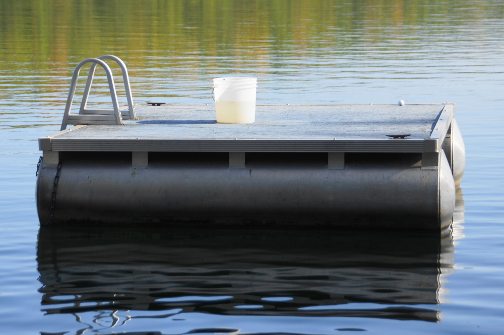 On the North end of the lake, one of our favorite summertime activities is chipping golf balls from the shore into a bucket on a raft. Points are also awarded for balls that miss the bucket, but stick on the top.