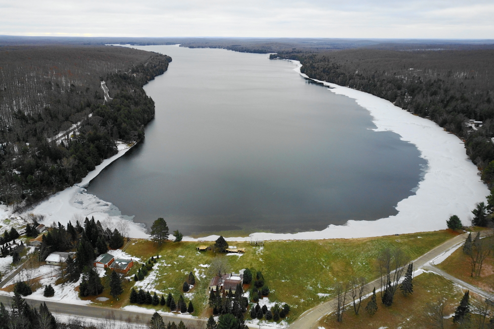 Early last week, the ice started to grow. It had appeared and receded in the past few weeks, but this looked and felt different. Some thought that the open water might make the weekend. Others felt that a November ice in was assured. All agreed that ice in was near. No one skied.