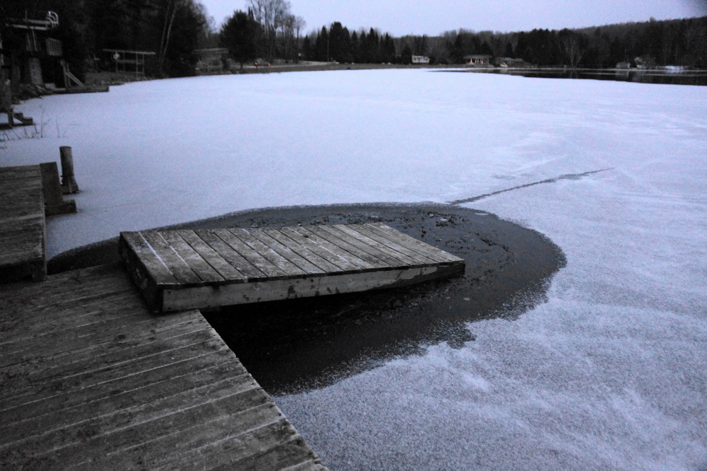 Pulling the frozen slab of legged wood on shore without going into the water was uglier than planned. Eventually it was rotated 180 degrees and slid out.