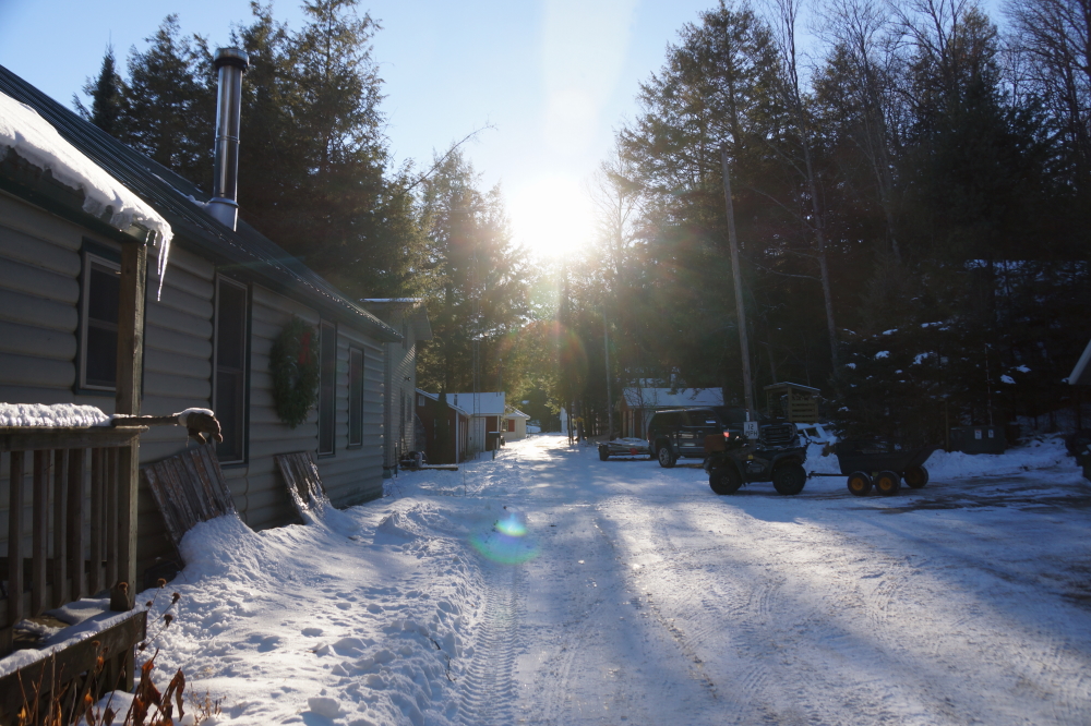 The warmer weather and sun have put a nice, hard ice coat on the lane. If you are gonna run, ditch the hat for a helmet. Elbow and knee pads are optional but highly recommended.