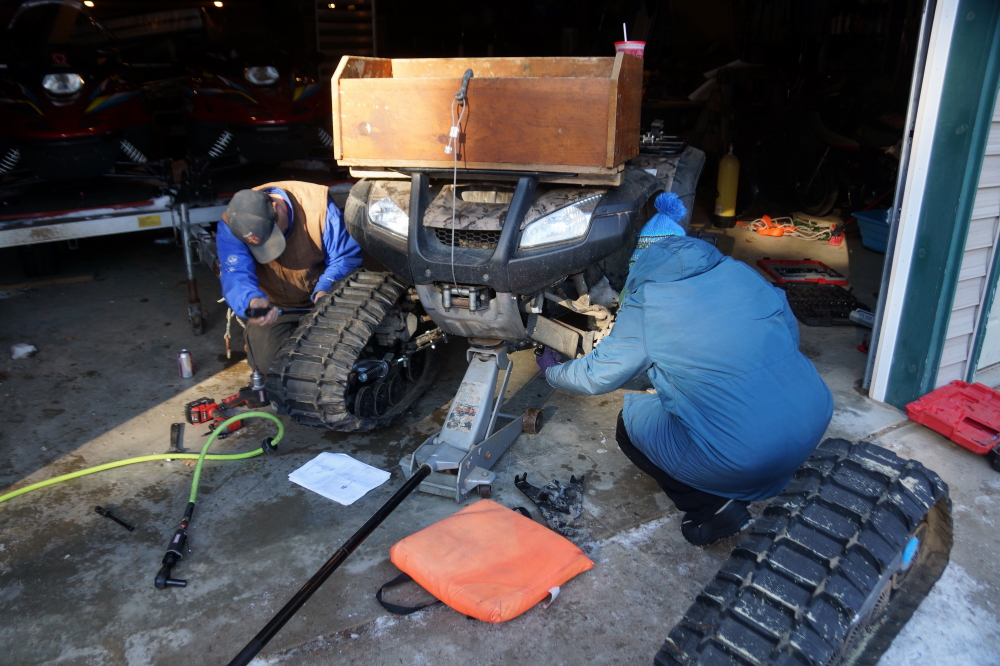 Usually the ATV gets its shoes changed in late January to pack the tapping trails and mine the early season sap. This year broke with tradition and feet were added during a 40°F day rather that a -40°F. The 80°F differential didn't make the task any more fun, but did make it less frostbitey. 