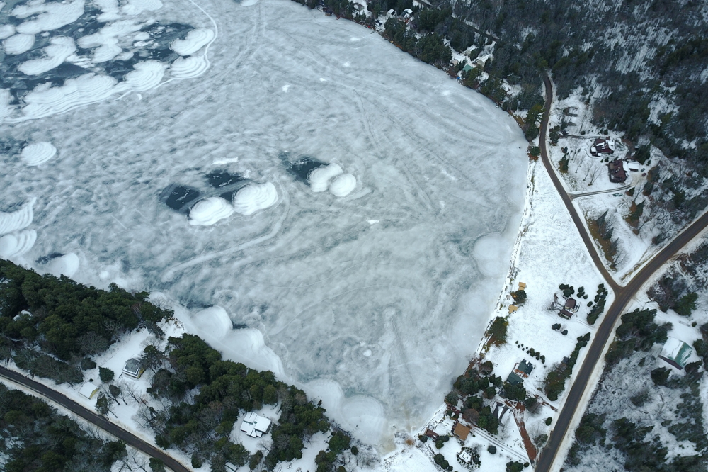 The snow that still exists on the North end of the lake has formed into patches that look like giant divots. If we don't get more snow in the next few weeks, we'll be mining these patches to make the forts for the 28th Annual Lake Lucerne Bottle Rocket War.