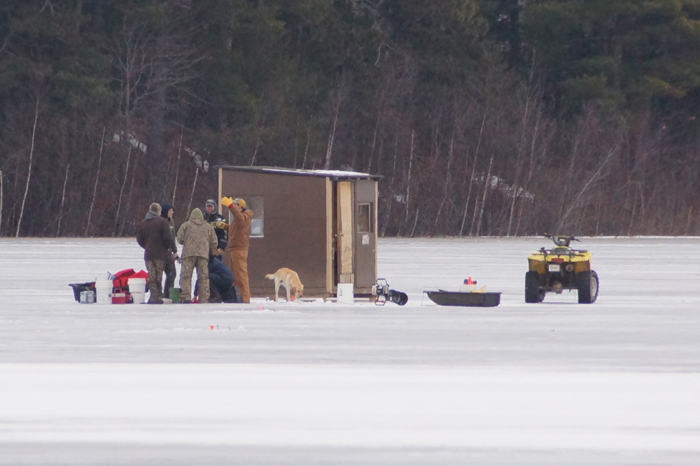 On the weekend, a hoard of ice fishermen were drilling holes and drinking beers just off the big island.