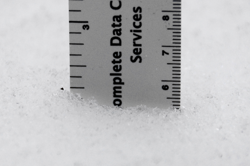 Then, at the last moment, it pushed further North, blessing the upper UP with a thick blanket of white and cursing our woods with the dreaded "Wintery Mix". The "up to 18 inches" became "2, with rain on top".