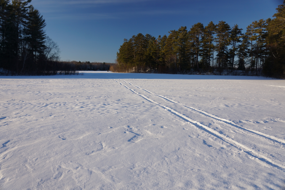 The naughty water skier slot between the islands had a few snowmobile tracks but was completely fisherman free.