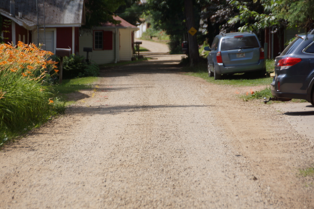 During the un-rainy parts of last week, Knott Lane got a new coat of road. It's much less bumpy now.