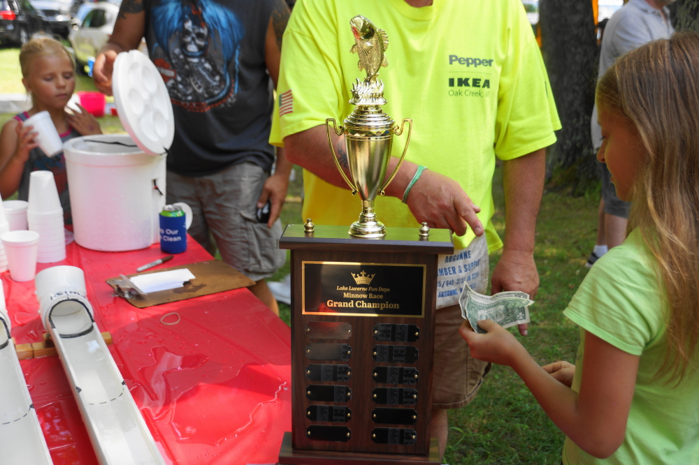 The person with the fastest minnow had their name added to the Landgraf Cup on permanent display at Water's Edge. There was a bit of controversy when the thoroughbred minnow "Beau Tiger Beau" was disqualified in the final race due to an early break or performance enhancing drugs or something.