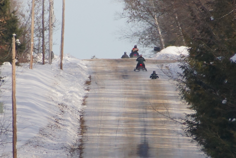 Side roads still held enough snow to support great louds of sleds and some sliding of sedans..