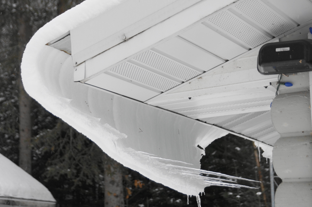 The snow coupled with warmer temperatures produced some impressive snow/ice curls that cling to the roof of the bar. They make quite a thump when they fall.