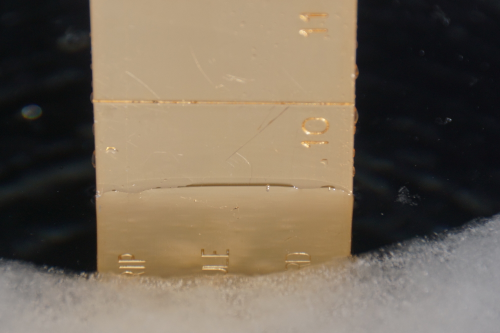 There's currently 9 inches of very good ice under a 2 inch frozen sheet of snow.