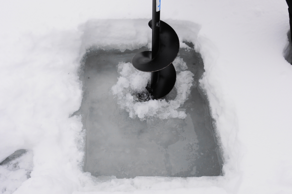 The inflow put a 2.5 inch layer of slush water under the 9 inches of snow on the lake. It made an ice thickness check a bit more interesting.