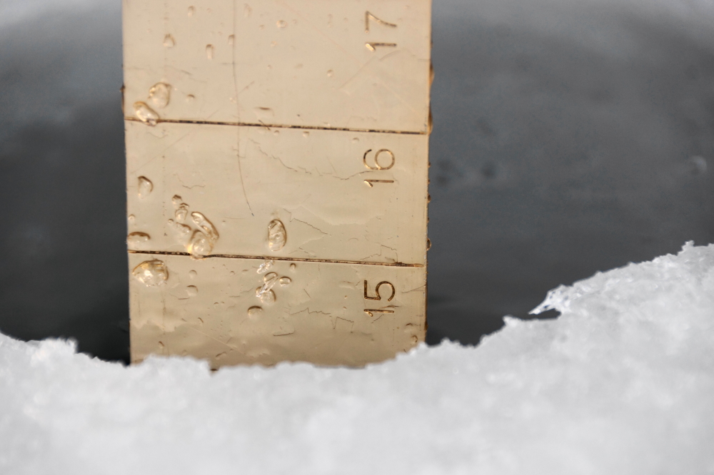 There's currently just over 14 inches of ice under about 2 inches of crusty snow.