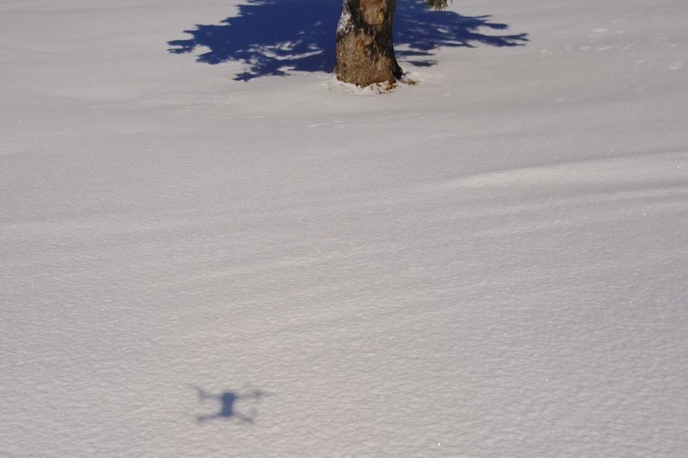 The weather was ideal for sitting at booth 1 in the bar and forcing drones to brave the arctic air to make tiny holes in the frozen sky, wee shadows on the white ground, and take a few pictures.