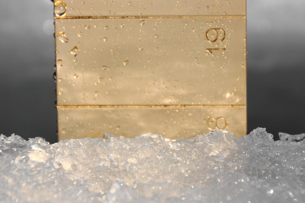 In addition to putting holes in maples, we made a hole in the lake to check the ice. There's almost 18 inches under about an inch of crusty, slushy snow.