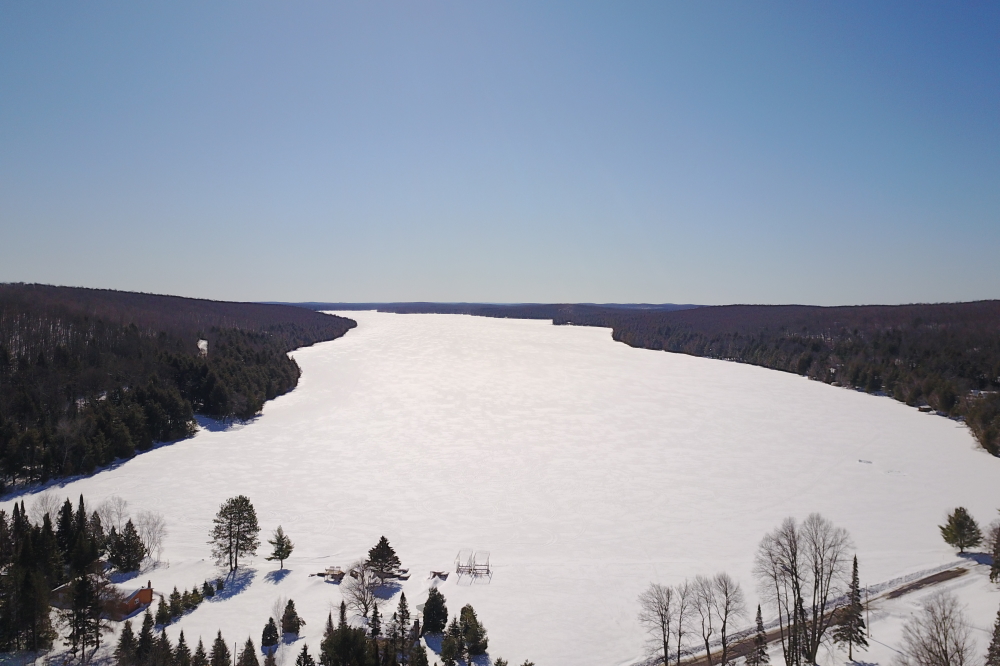 There was some snow and a few mornings fell into the teens (°F) but last week had more of a Spring shine than a Winter residue. It was time. Time to enter the ice-out contest. Time to check the lake ice. But mostly, it was time to put holes in maples, collect sap, and fire the cookers.