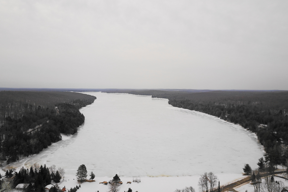 Last week started off warm and slid down to cold by the weekend. The overcast turned to clear, the water and slush turned to ice. Such seasonal backsliding is not uncommon in the northwoods, it's just not hoped for, 