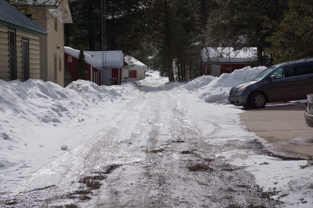 Knott Lane remains not so clear. There are a few patches of exposed road, but much of the lane is thick, tracked ice more suitable for a luge run than a cottage thoroughfare.
