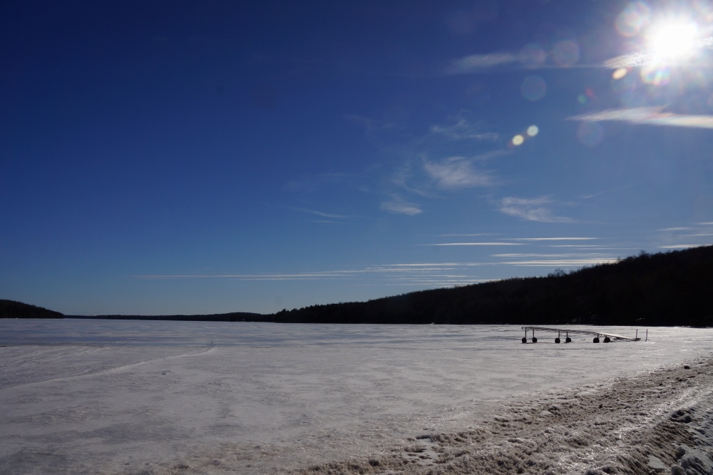 With 19+ inches of ice covering the lake, it's becoming less likely that we'll enjoy a March ice-out. It's still possible, but we'll need a steep slide back to warm with some wind and rain added to the mix. The forecast for next week has some warm and some cold. And some snow and some rain. Last week's rain came while the men were out in the field collecting sap. On that day, many were wet long after the sun when down.<br><br><br>-Nemo prefers his trails packed and his taps beard free.