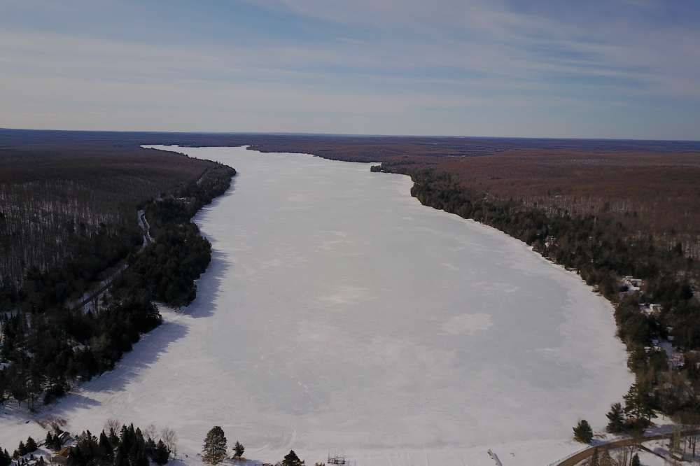 Well that stung. Just before the weekend, the giant puddle that extended over most of the lake froze hard and was garnished with some blown snow and frost flowers. Along with the polar cold came blue sky, stopped maples, and canceled tee times. The long term forecast calls for thinning ice, a clearer Knott Lane, and more sap dripping.  The long term forecast missed this one, so we are not taking off our hats just yet.<br><br><br>-Nemo was soaked and shivery long after the sun when down.