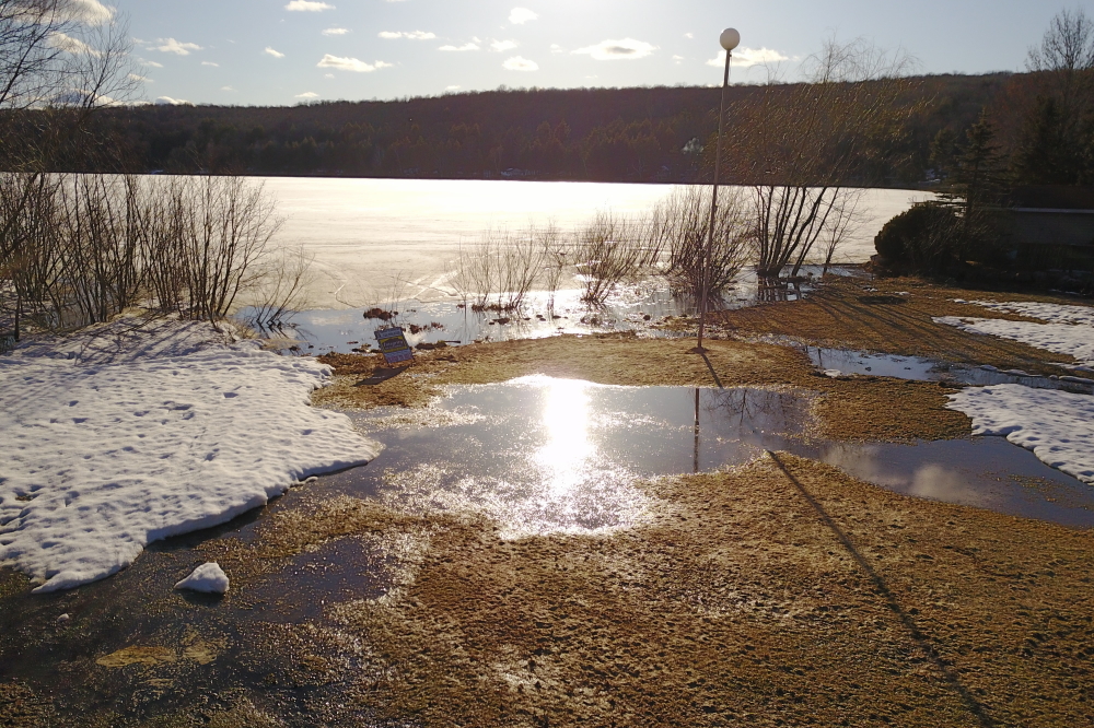 In addition to the level going up, if the lawn puddles get any bigger, Lake Lucerne will get larger.